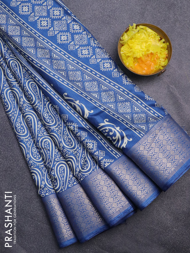 Semi dola saree blue with allover prints and zari woven border