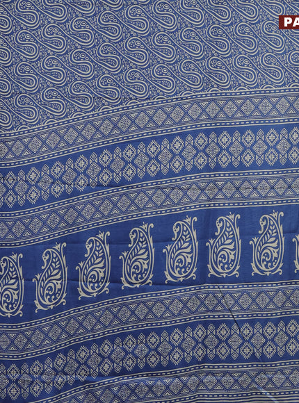 Semi dola saree blue with allover prints and zari woven border