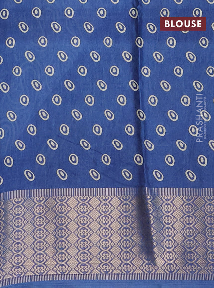 Semi dola saree blue with allover prints and zari woven border