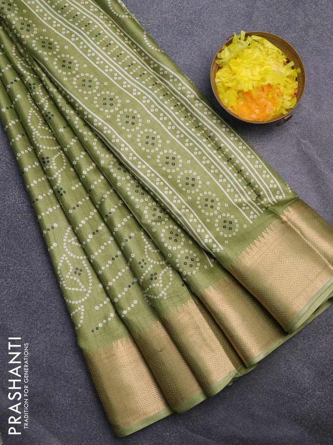 Semi dola saree green with allover prints and zari woven border