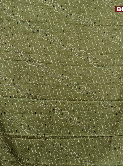 Semi dola saree green with allover prints and zari woven border