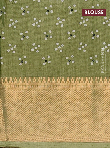 Semi dola saree green with allover prints and zari woven border