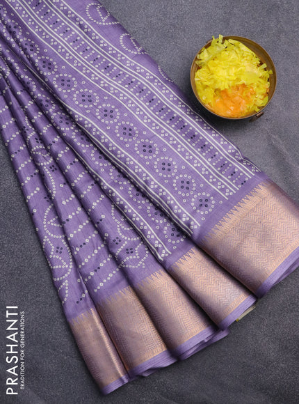 Semi dola saree pastel violet with allover prints and zari woven border