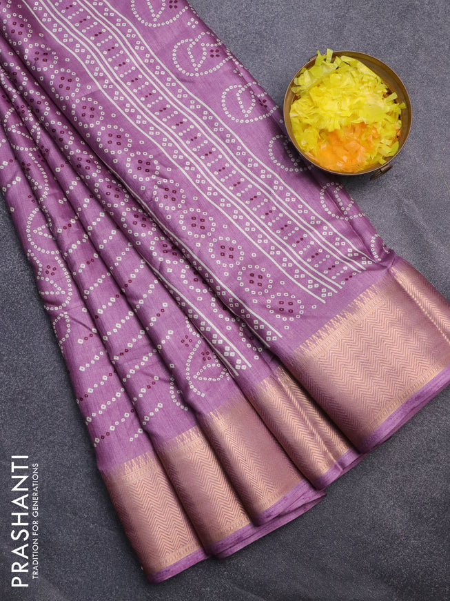 Semi dola saree mauve pink with allover prints and zari woven border