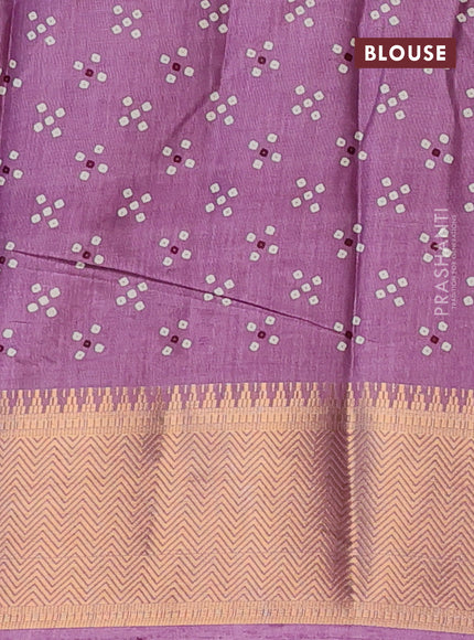 Semi dola saree mauve pink with allover prints and zari woven border