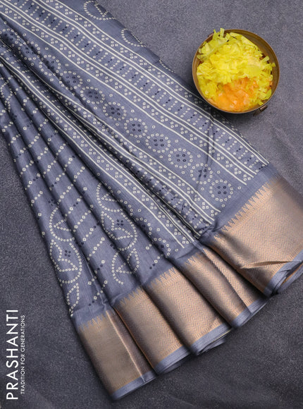 Semi dola saree grey with allover prints and zari woven border