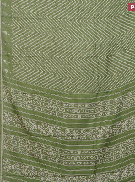 Semi dola saree pastel green with allover zig zag ikat weaves and zari woven border