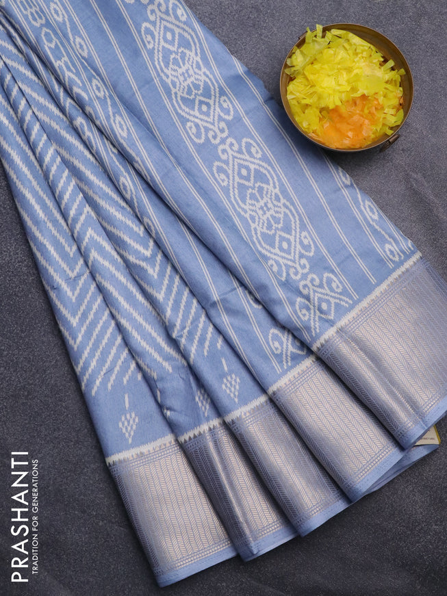 Semi dola saree pastel blue with allover zig zag ikat weaves and zari woven border