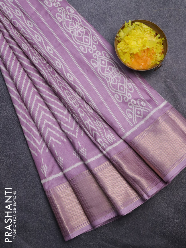 Semi dola saree lavender with allover zig zag ikat weaves and zari woven border