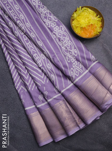 Semi dola saree pastel violet shade with allover zig zag ikat weaves and zari woven border