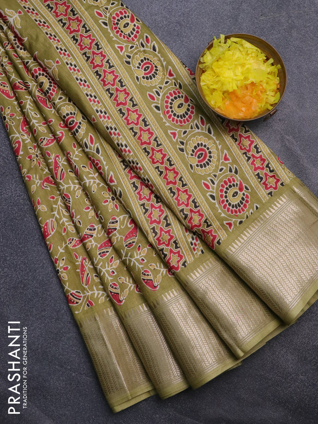 Semi dola saree mehendi green with allover prints and zari woven border