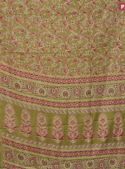 Semi dola saree mehendi green with allover prints and zari woven border