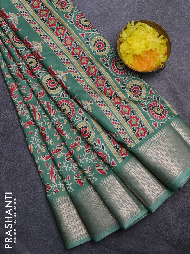 Semi dola saree green shade with allover prints and zari woven border