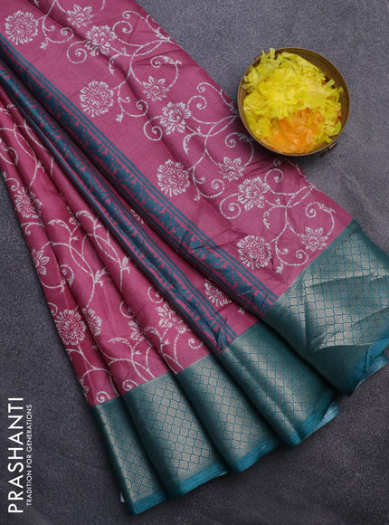 Semi dola saree mauve pink and peacock green with allover floral prints and zari woven border