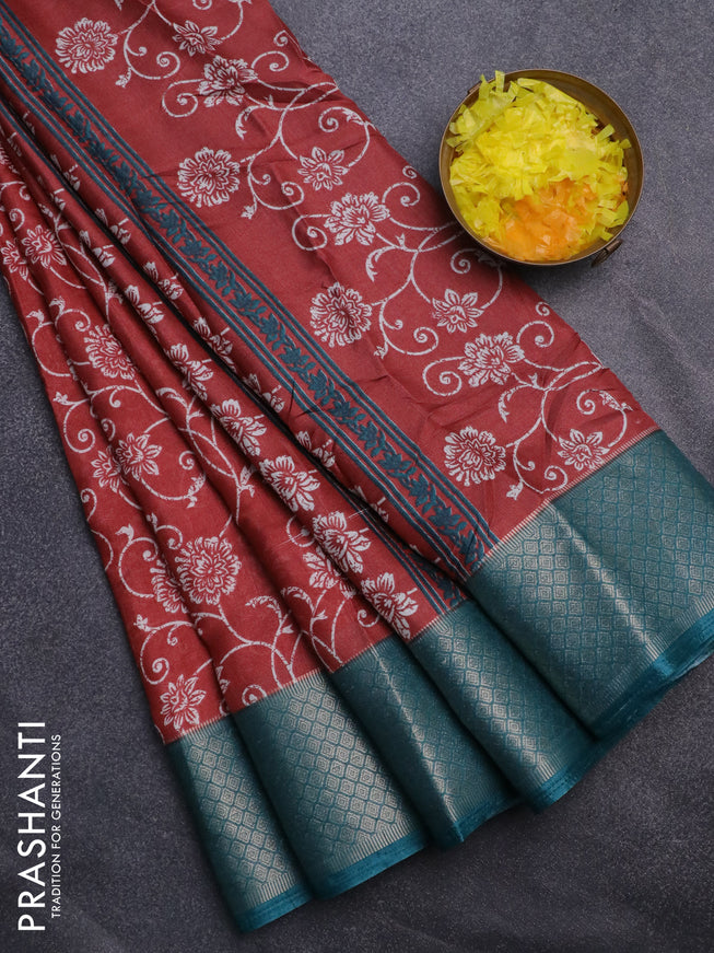 Semi dola saree pastel maroon and peacock green with allover floral prints and zari woven border