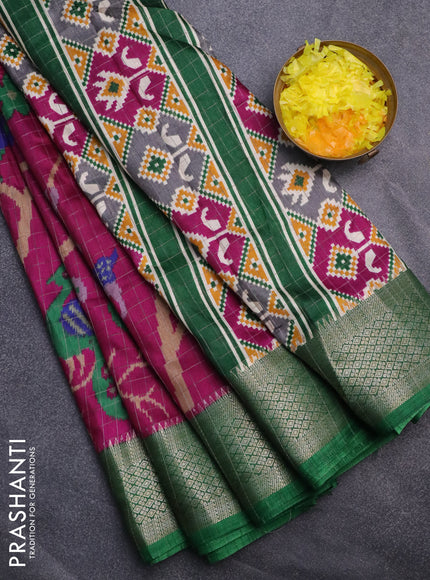 Semi dola saree magenta pink and green with allover zari checks & ikat style prints and zari woven border