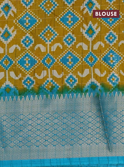 Semi dola saree mustard yellow and teal blue with allover zari checks & ikat style prints and zari woven border