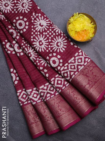 Semi dola saree wine shade with allover zari checks & batik prints and zari woven border