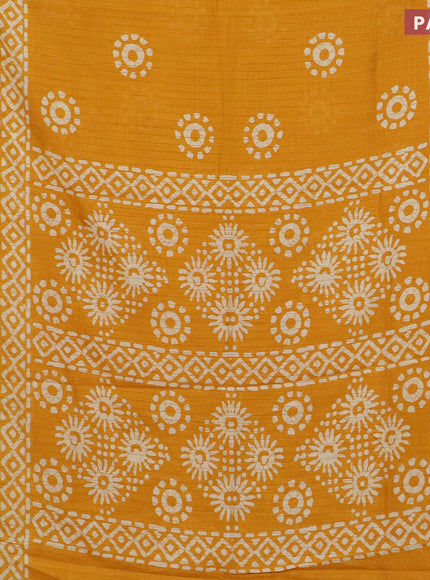 Semi dola saree mango yellow with allover zari checks & batik prints and zari woven border