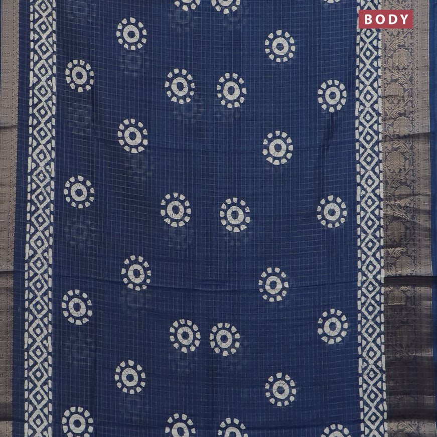 Semi dola saree blue with allover zari checks & batik prints and zari woven border