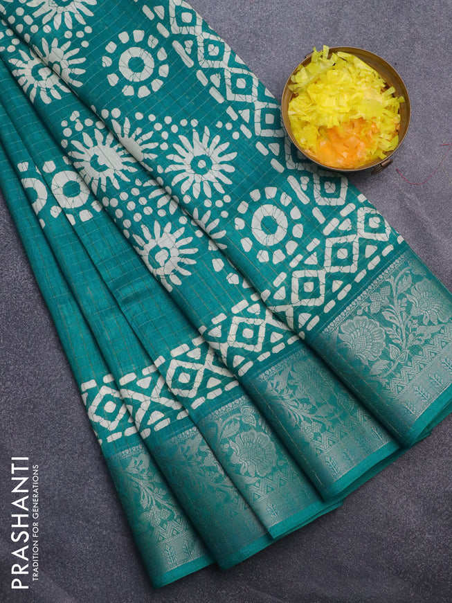 Semi dola saree teal green with allover zari checks & batik prints and zari woven border