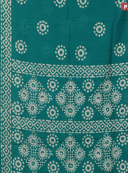 Semi dola saree teal green with allover zari checks & batik prints and zari woven border