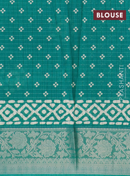 Semi dola saree teal green with allover zari checks & batik prints and zari woven border