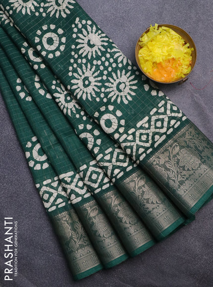 Semi dola saree green with allover zari checks & batik prints and zari woven border