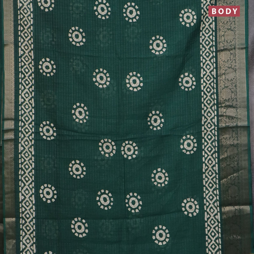 Semi dola saree green with allover zari checks & batik prints and zari woven border