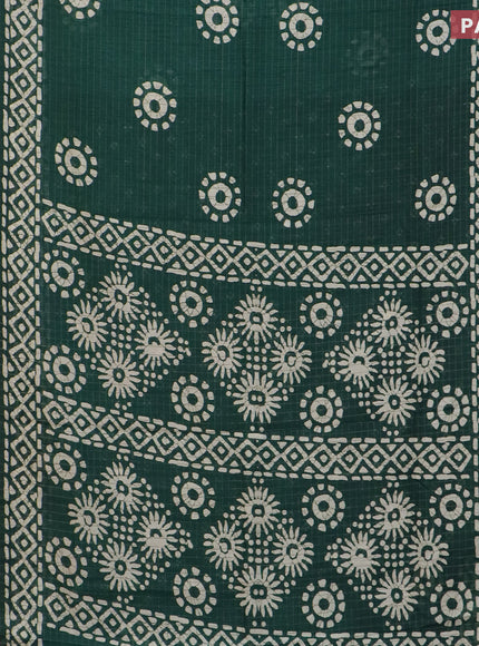 Semi dola saree green with allover zari checks & batik prints and zari woven border