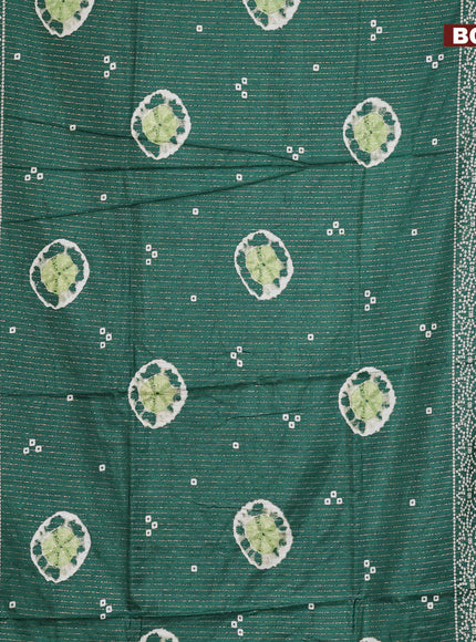 Semi dola saree green with allover zari weaves & butta prints and zari woven border