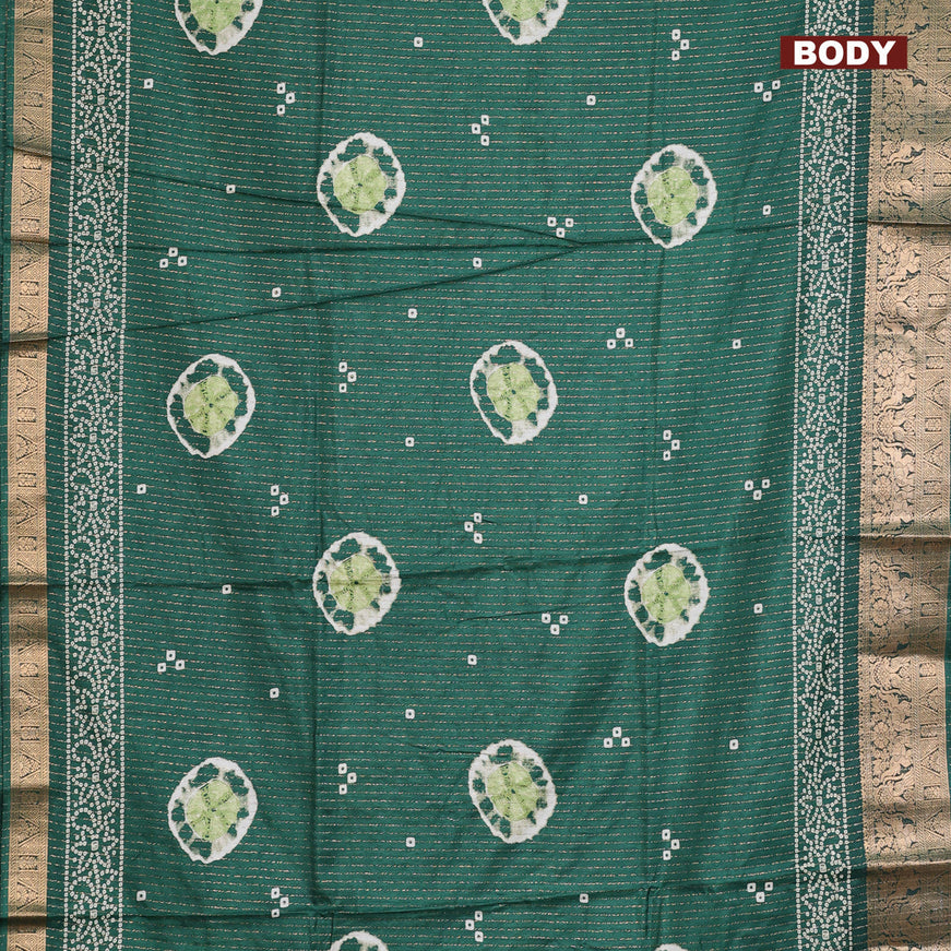 Semi dola saree green with allover zari weaves & butta prints and zari woven border