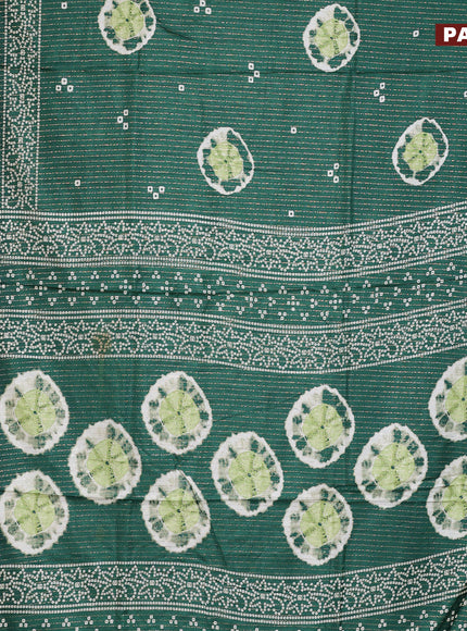 Semi dola saree green with allover zari weaves & butta prints and zari woven border