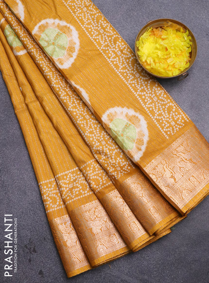 Semi dola saree mustard yellow with allover zari weaves & butta prints and zari woven border