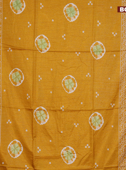 Semi dola saree mustard yellow with allover zari weaves & butta prints and zari woven border