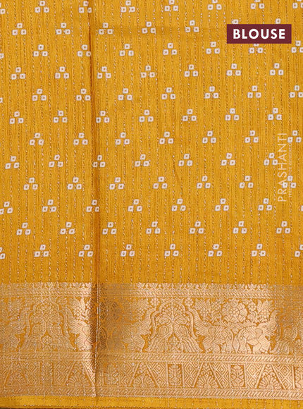 Semi dola saree mustard yellow with allover zari weaves & butta prints and zari woven border