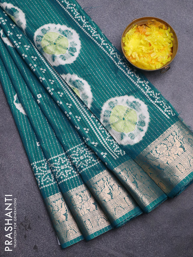 Semi dola saree teal blue with allover zari weaves & butta prints and zari woven border