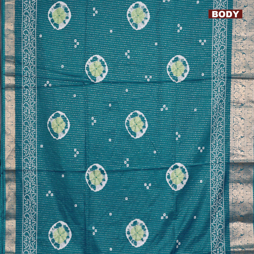 Semi dola saree teal blue with allover zari weaves & butta prints and zari woven border