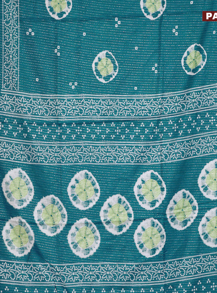 Semi dola saree teal blue with allover zari weaves & butta prints and zari woven border