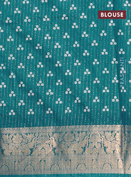 Semi dola saree teal blue with allover zari weaves & butta prints and zari woven border