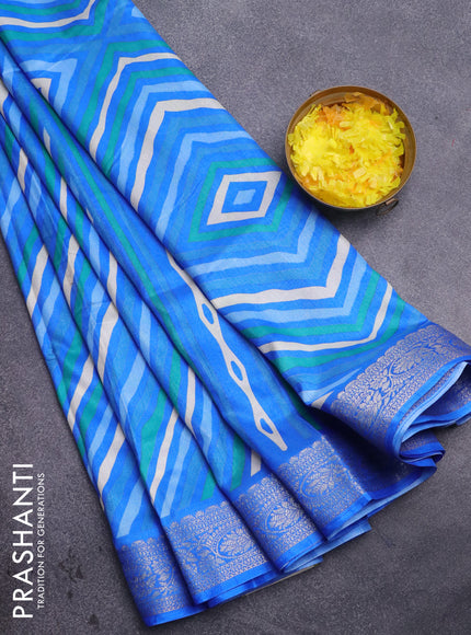 Semi dola saree multi colour and blue with allover leheriya style prints and zari woven border