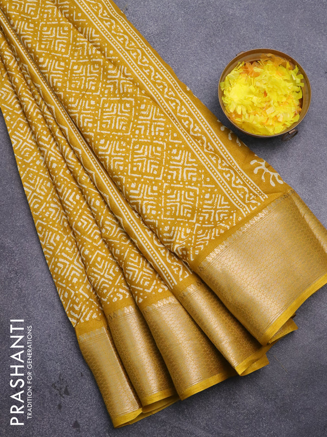 Semi dola saree mustard yellow with geometric prints and zari woven border