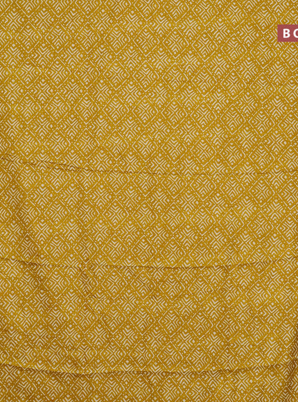 Semi dola saree mustard yellow with geometric prints and zari woven border