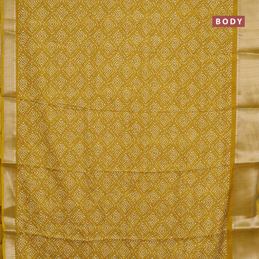 Semi dola saree mustard yellow with geometric prints and zari woven border