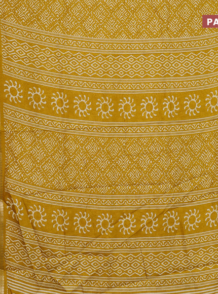 Semi dola saree mustard yellow with geometric prints and zari woven border