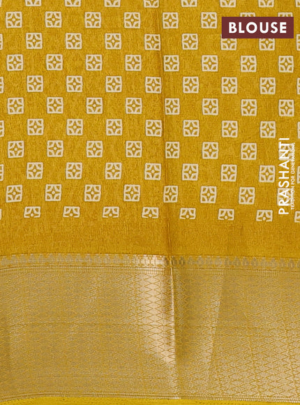 Semi dola saree mustard yellow with geometric prints and zari woven border