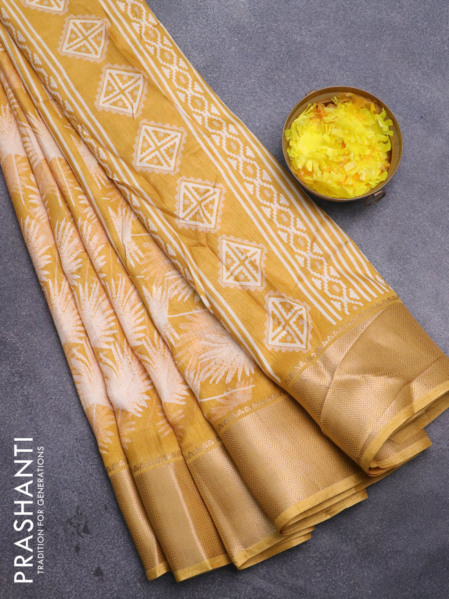 Semi dola saree yellow with allover prints and zari woven border