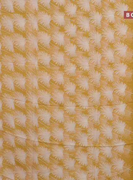 Semi dola saree yellow with allover prints and zari woven border