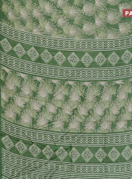 Semi dola saree green shade with allover prints and zari woven border