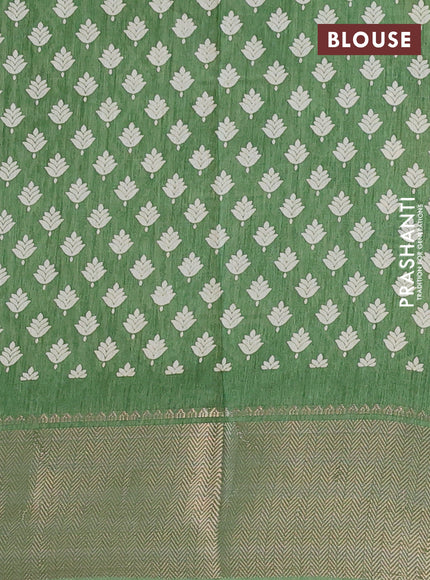 Semi dola saree green shade with allover prints and zari woven border